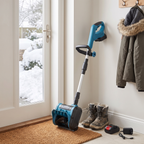 FrostSweeper stored by the front door next to winter boots